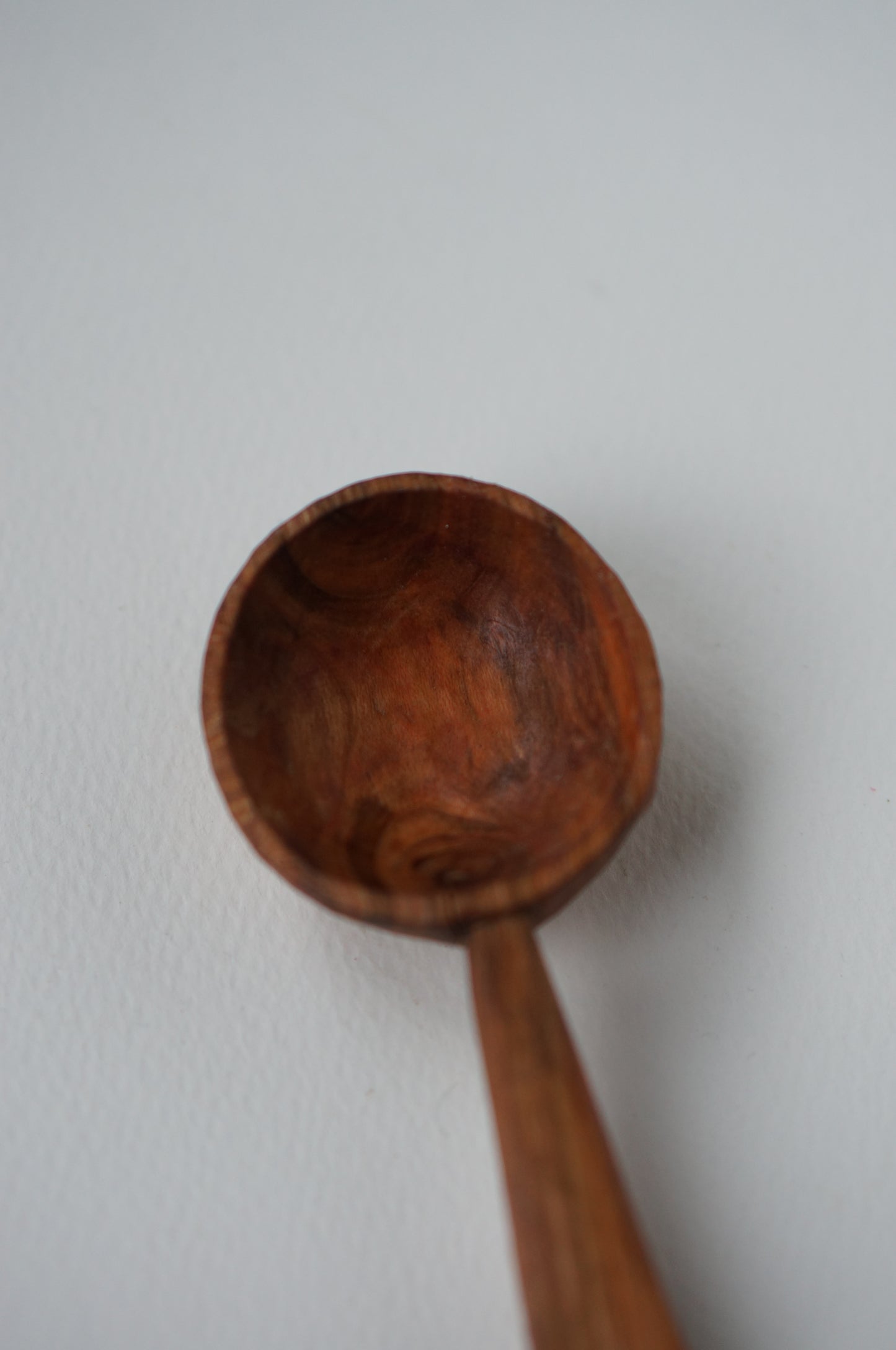 Coffee spoon with a coffee bean carving