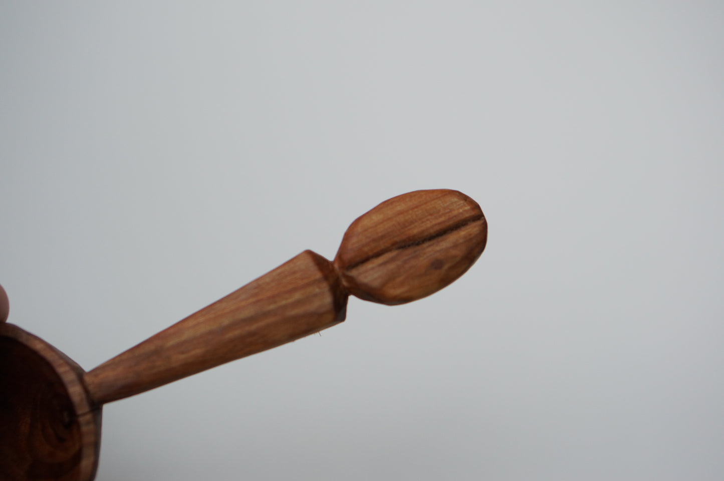 Coffee spoon with a coffee bean carving