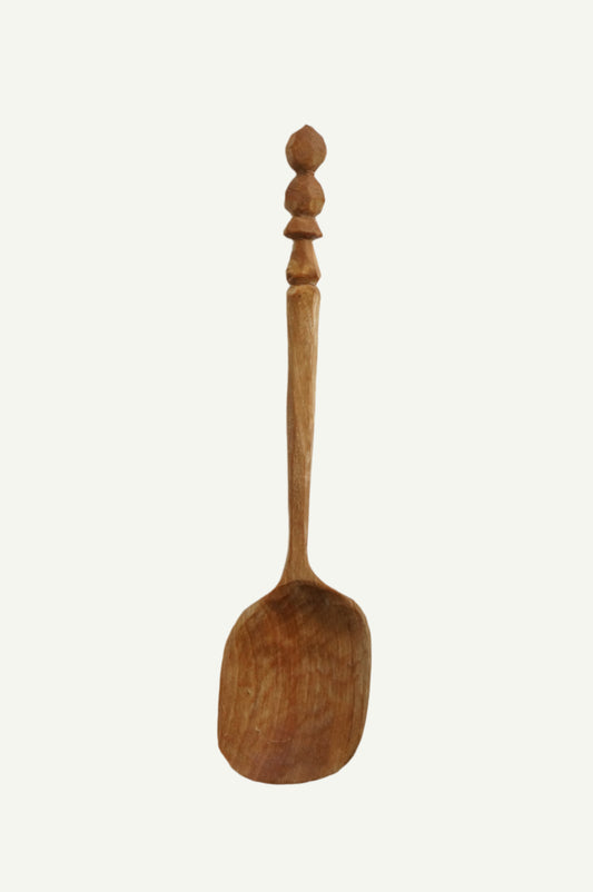 Cooking spoon with ornaments